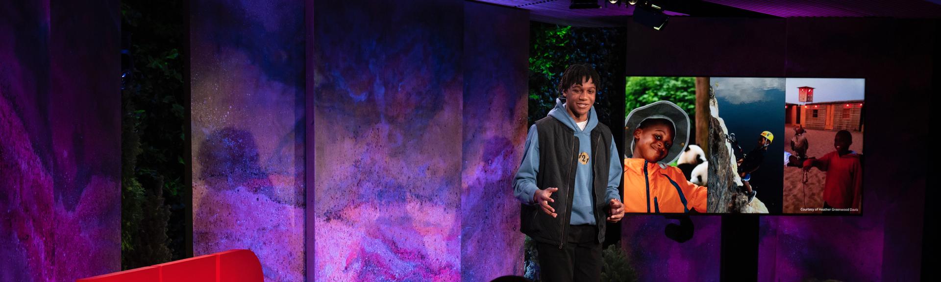 Cameron Davis gives a TED talk on the TED stage.